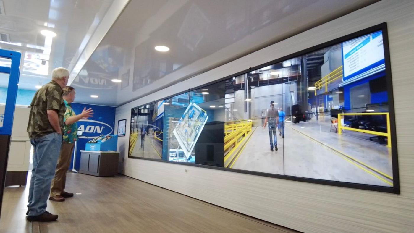 Sales team using the touchscreen wall